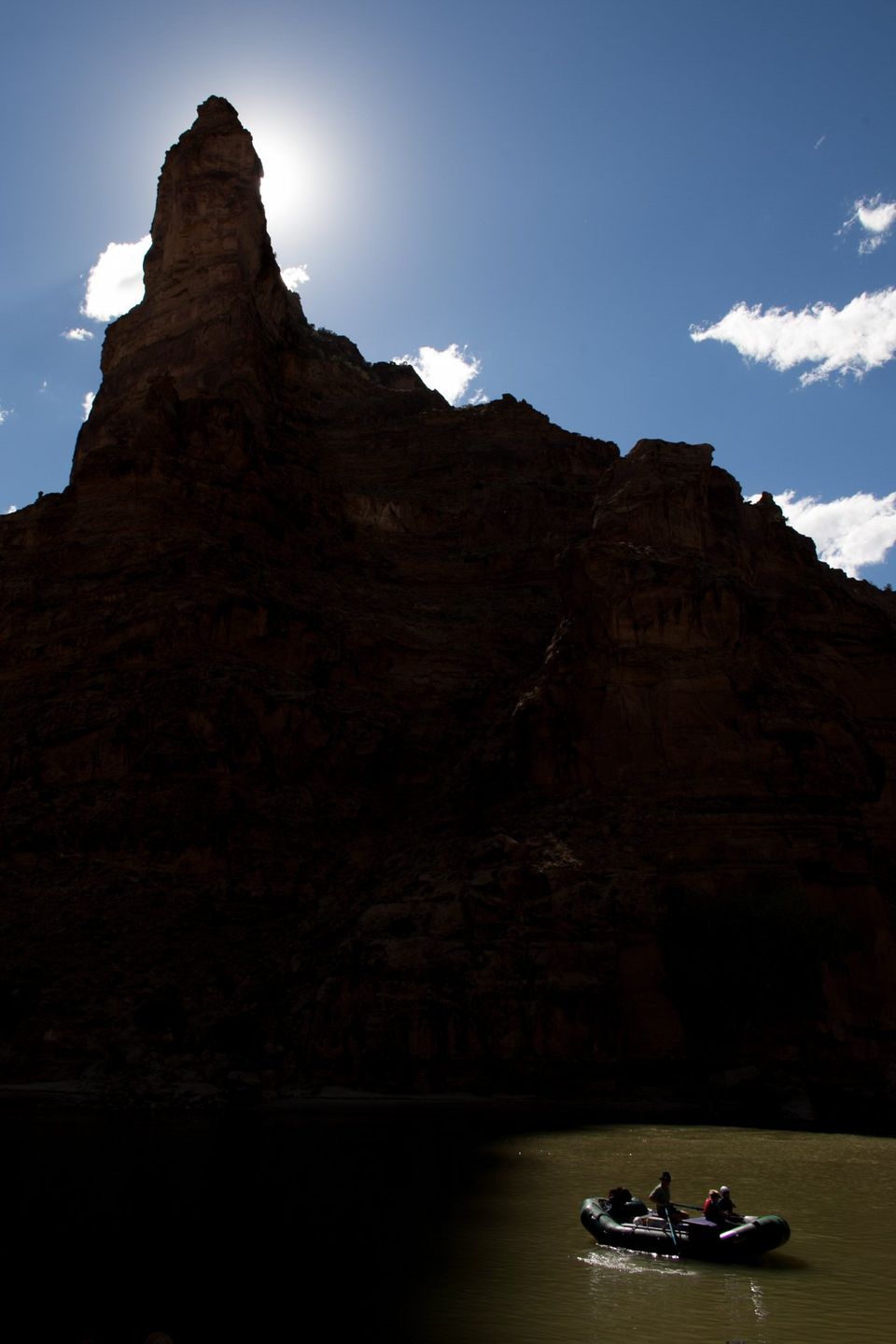 Green River Rafting. A rafting party floats past spires at the end of Gray Canyon on the Green River, Utah.