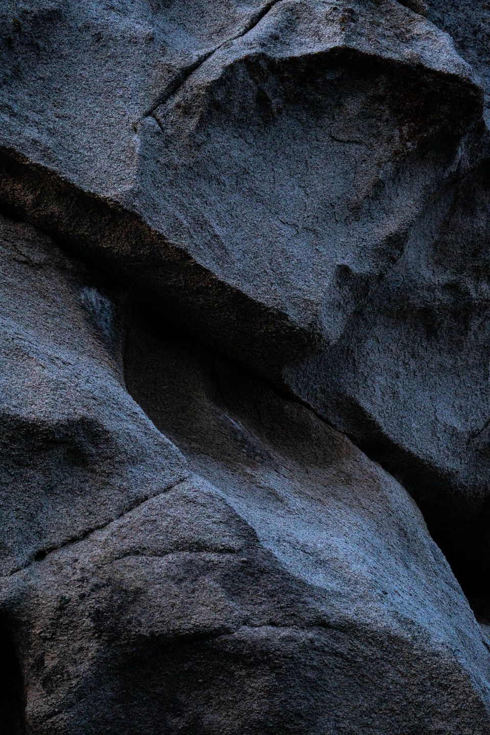 Humble Granite. A detail of a granite formation reveals the resemblance of a humble head and body.
