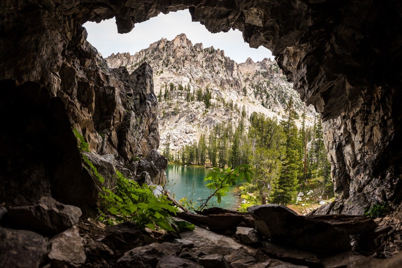Mountain Cave, Sawtooth Range, Idaho. On an overnight hike we climbed into a cave and found it framed the distant ridge beautifully.
