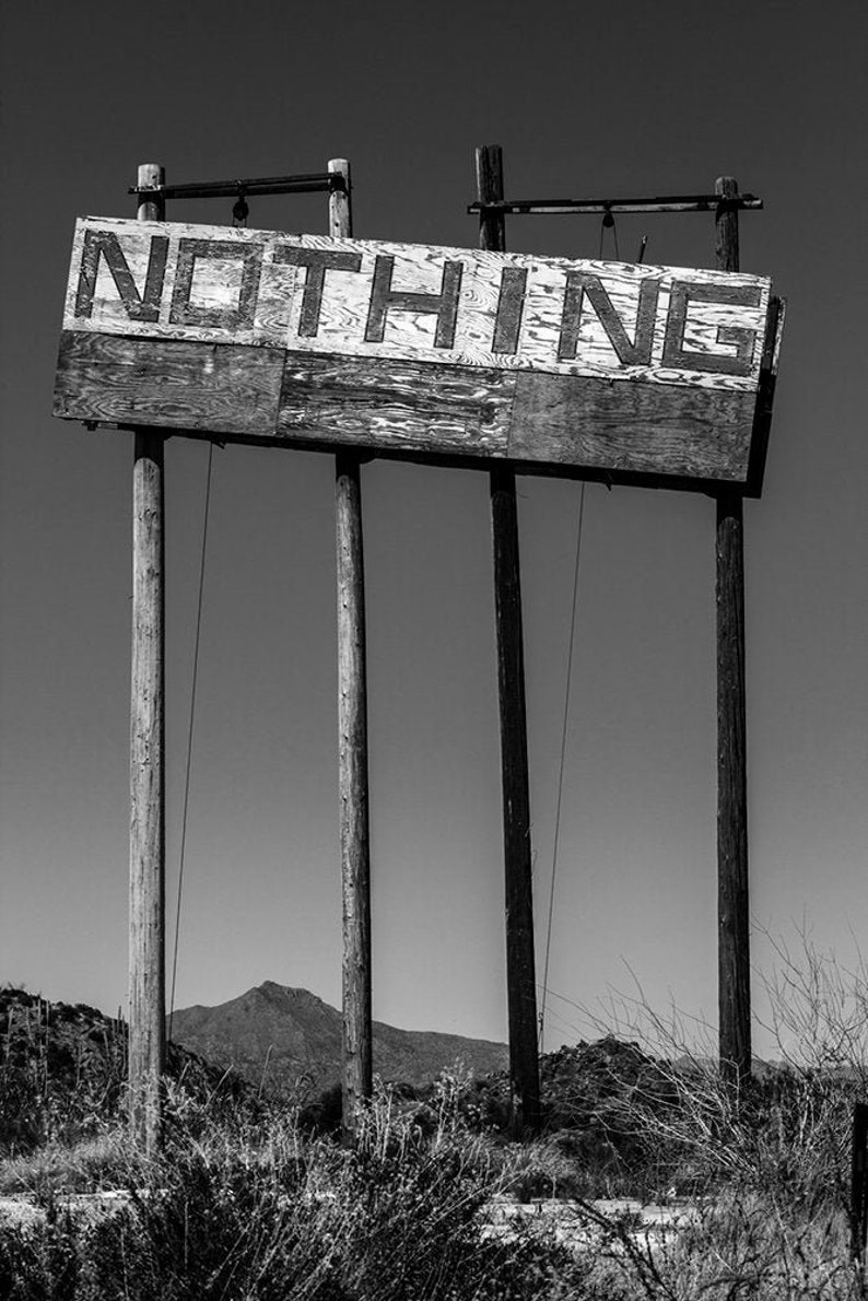 NOTHING. A deserted sign in Arizona. Black and white.