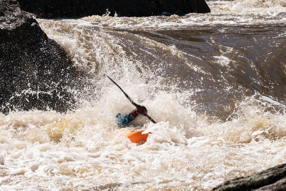Owyhee River Kayaking. Jeff Ford drops a chute on the Owyhee as the river rises with the spring thaw.