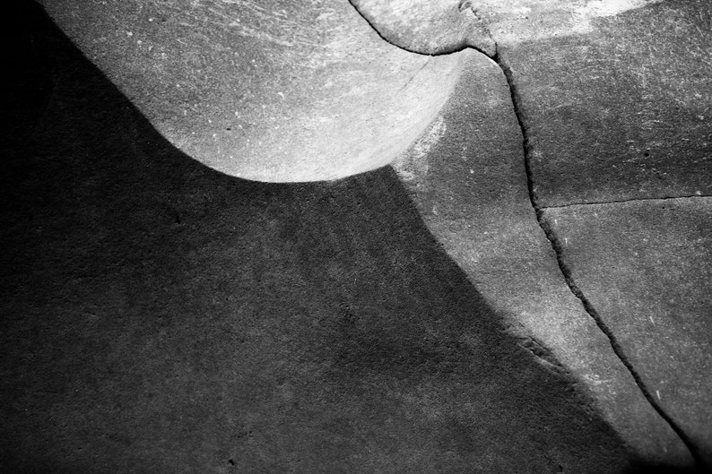 Rock Shadows Detail. Smooth rock casts shadows. Abstract.