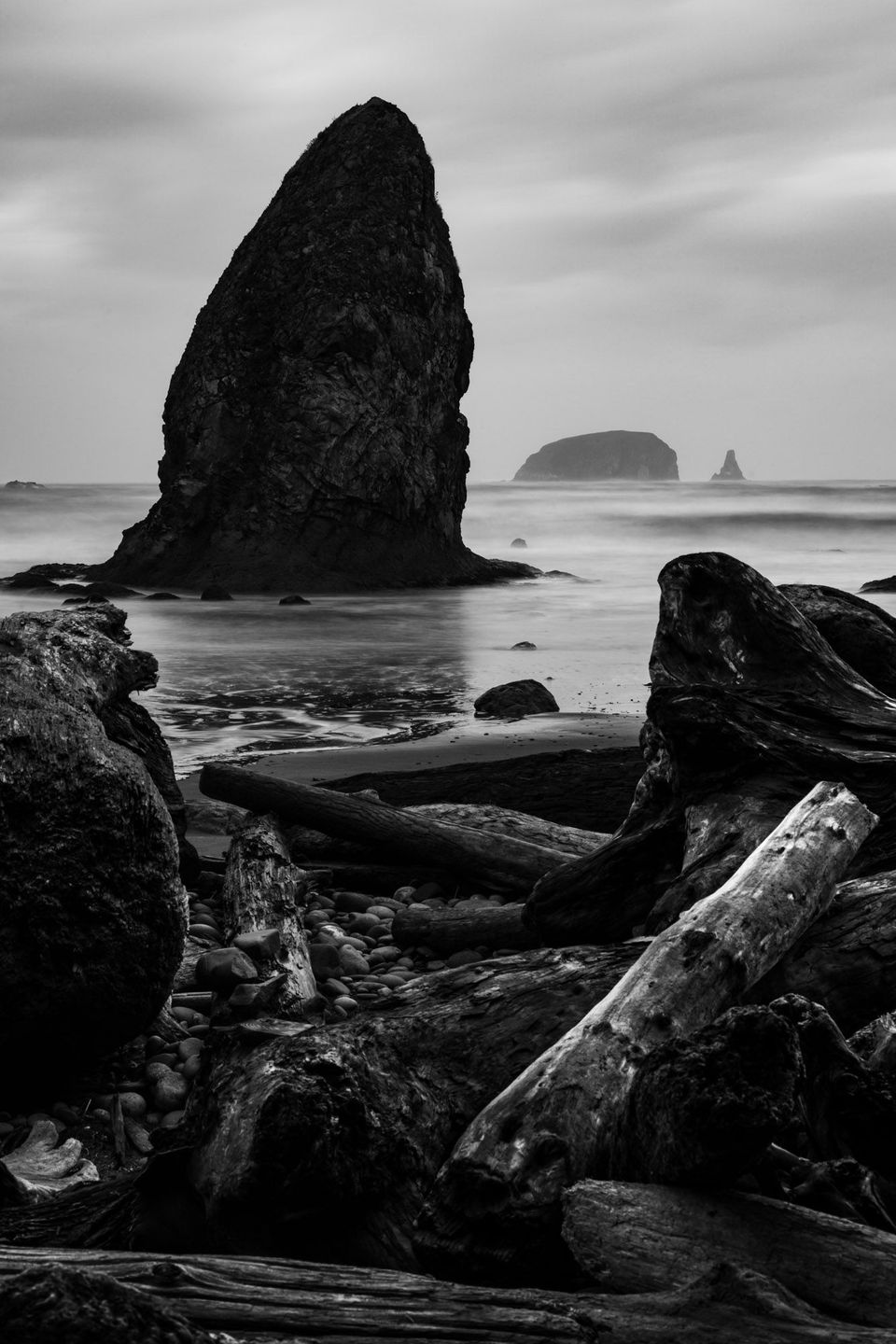 Seastacks. Seastacks are the remains of ancient headlands eroded by ocean and weather, likely volcanic plugs that better withstood the constant erosion.