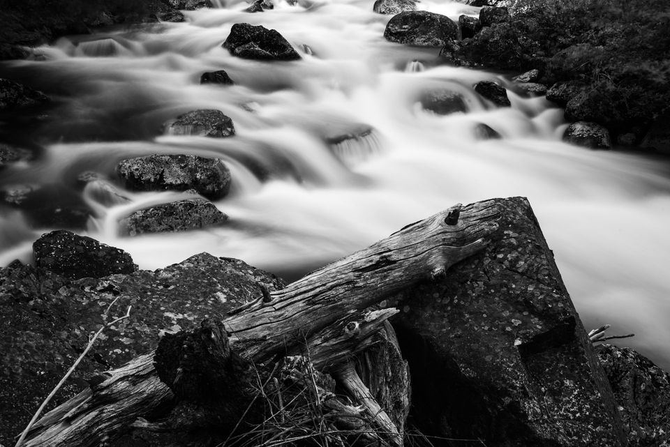 Sheep Creek, Idaho. Water erodes rock too slowly for the eye to see. A slow shutter speed reveals the current's effect.