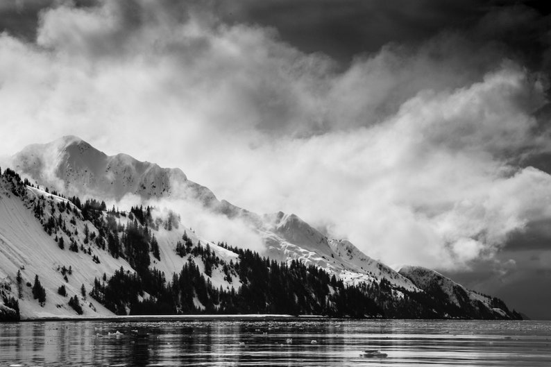 Stormy Peaks, Aialik Bay, Alaska. Storm clouds part around the high peaks of Aialik Bay, Kenai Fjords National Park.